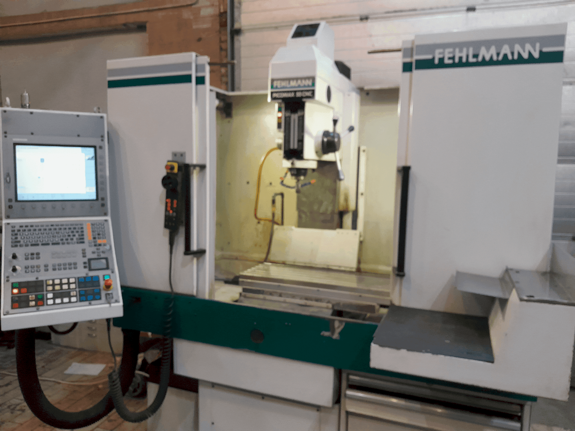 Vista Frontal  da FEHLMANN PICOMAX 55 CNC 2/3  máquina