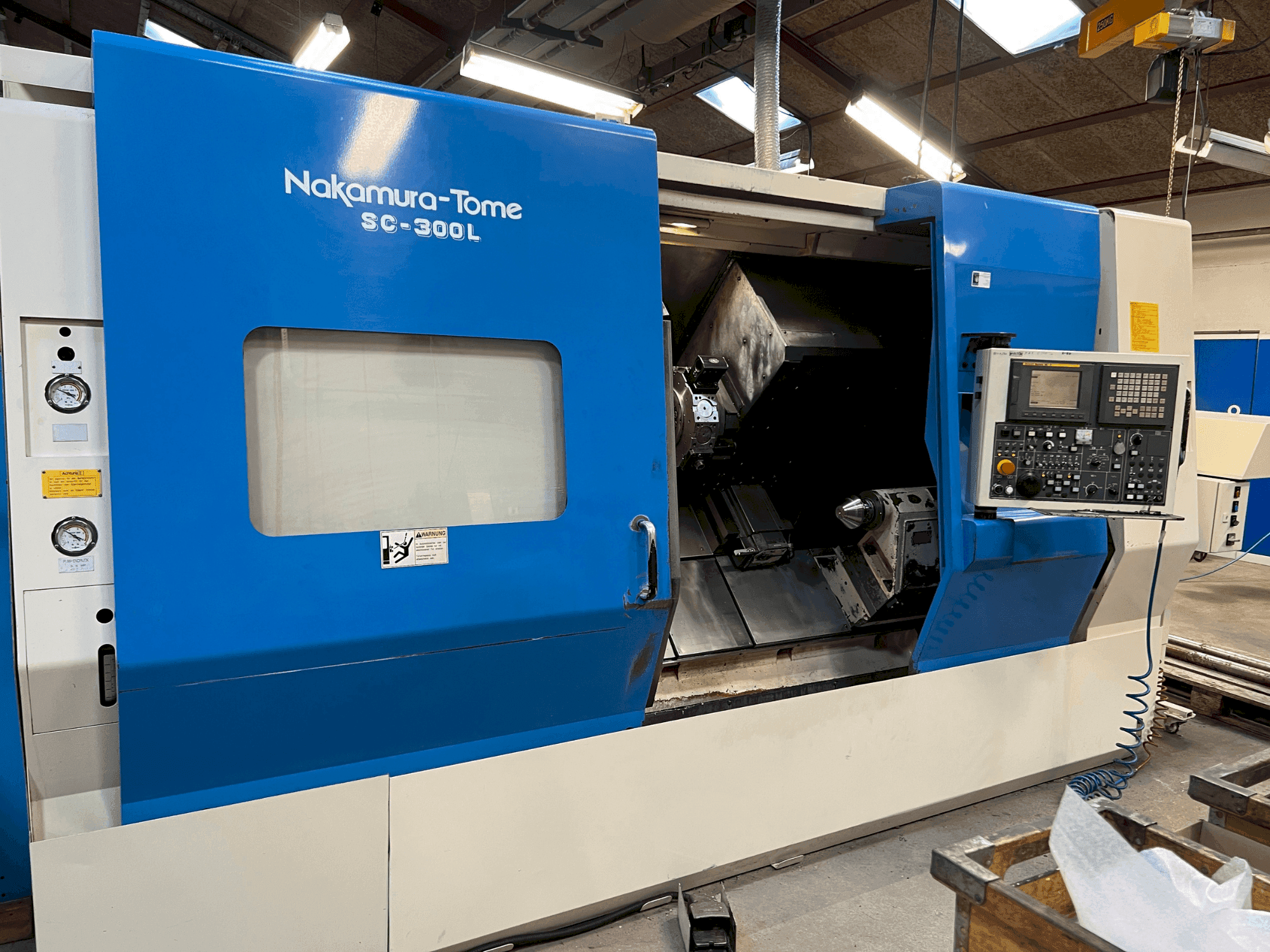 Vista Frontal  da NAKAMURA SL 300LY  máquina