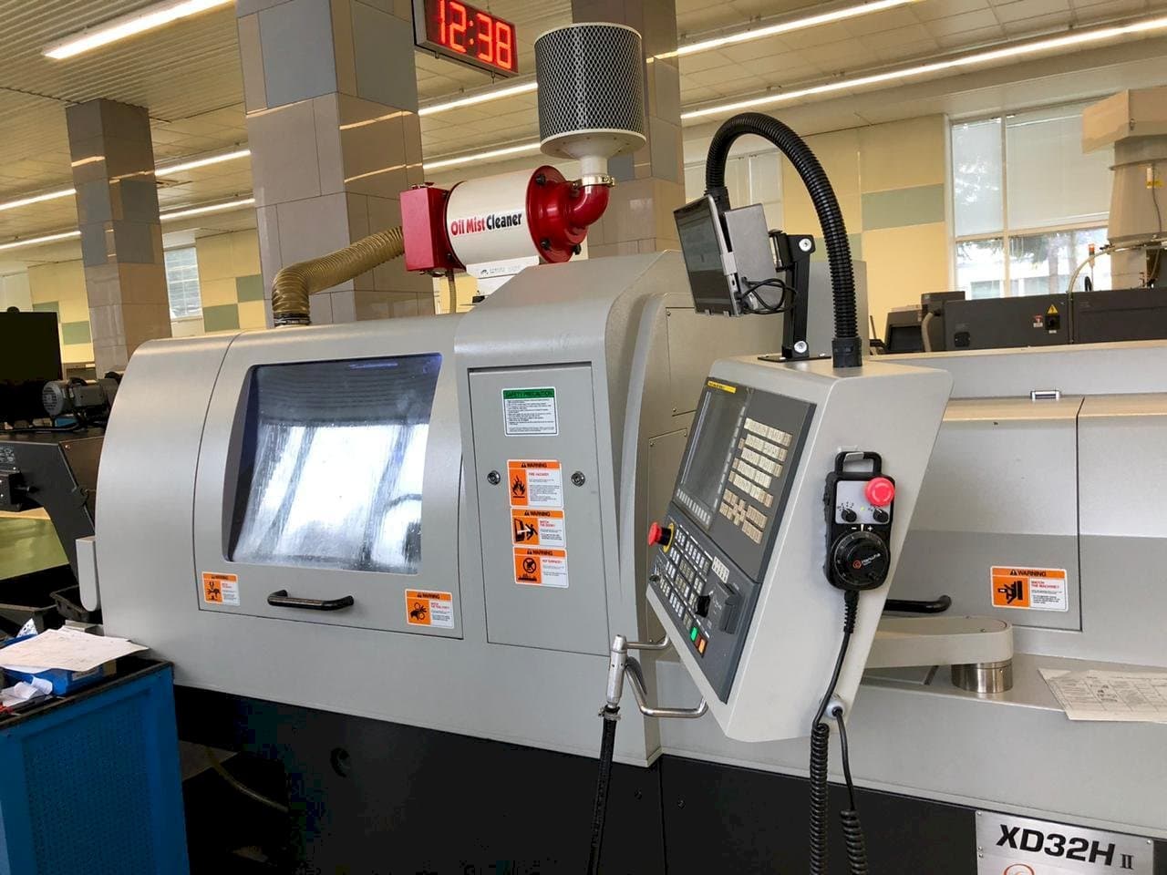 Vista Frontal  da Hanwha XD32H II  máquina