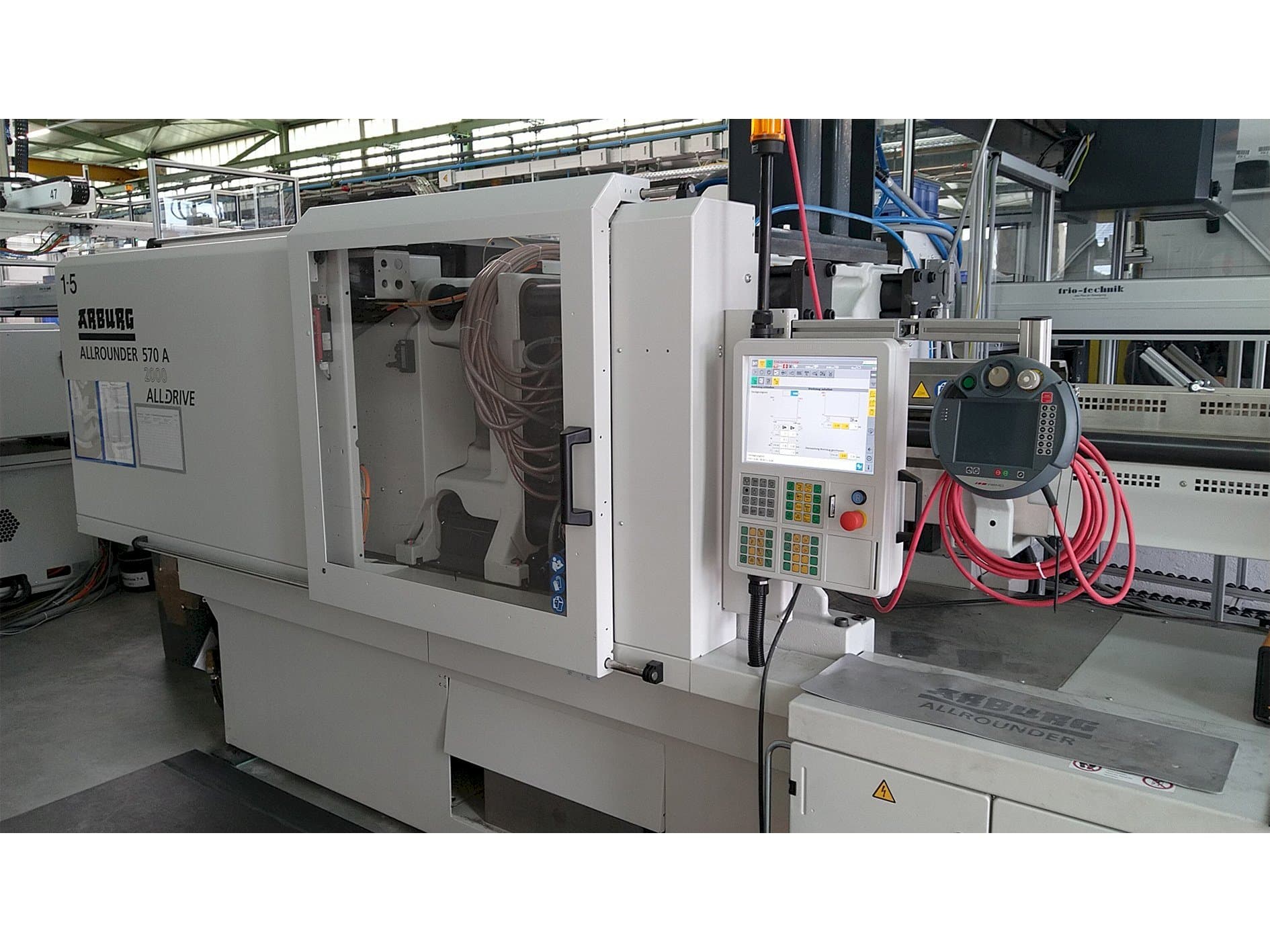 Vista Frontal  da Arburg Allrounder 570 A 2000-800 ALLDRIVE  máquina