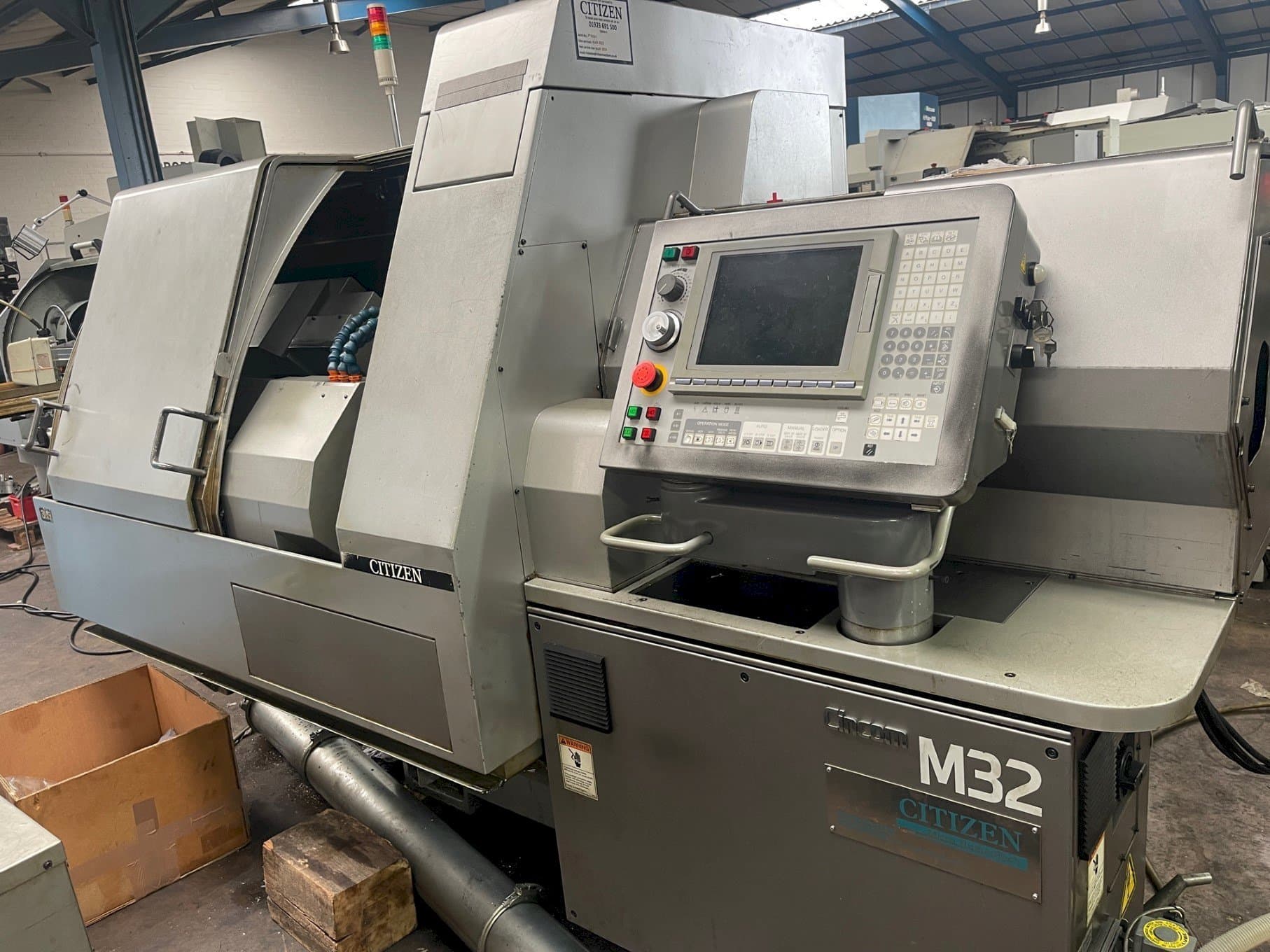 Vista Frontal  da Citizen M-32V  máquina