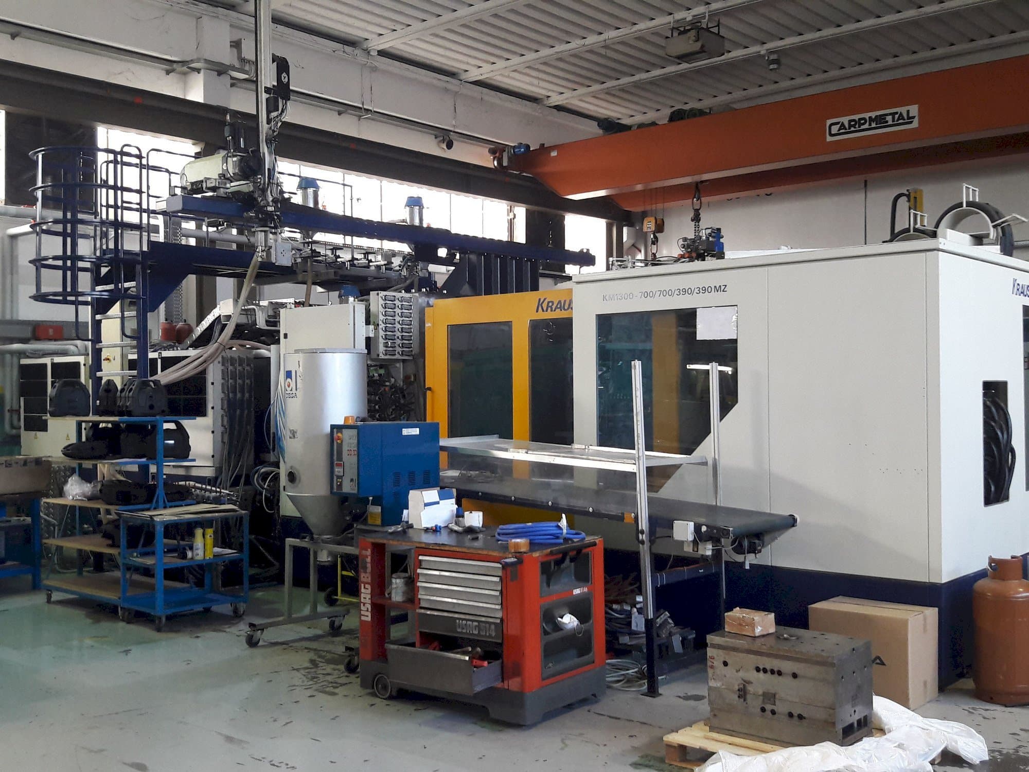 Vista Frontal  da Krauss Maffei 1300-700-700-390-390 MZ  máquina