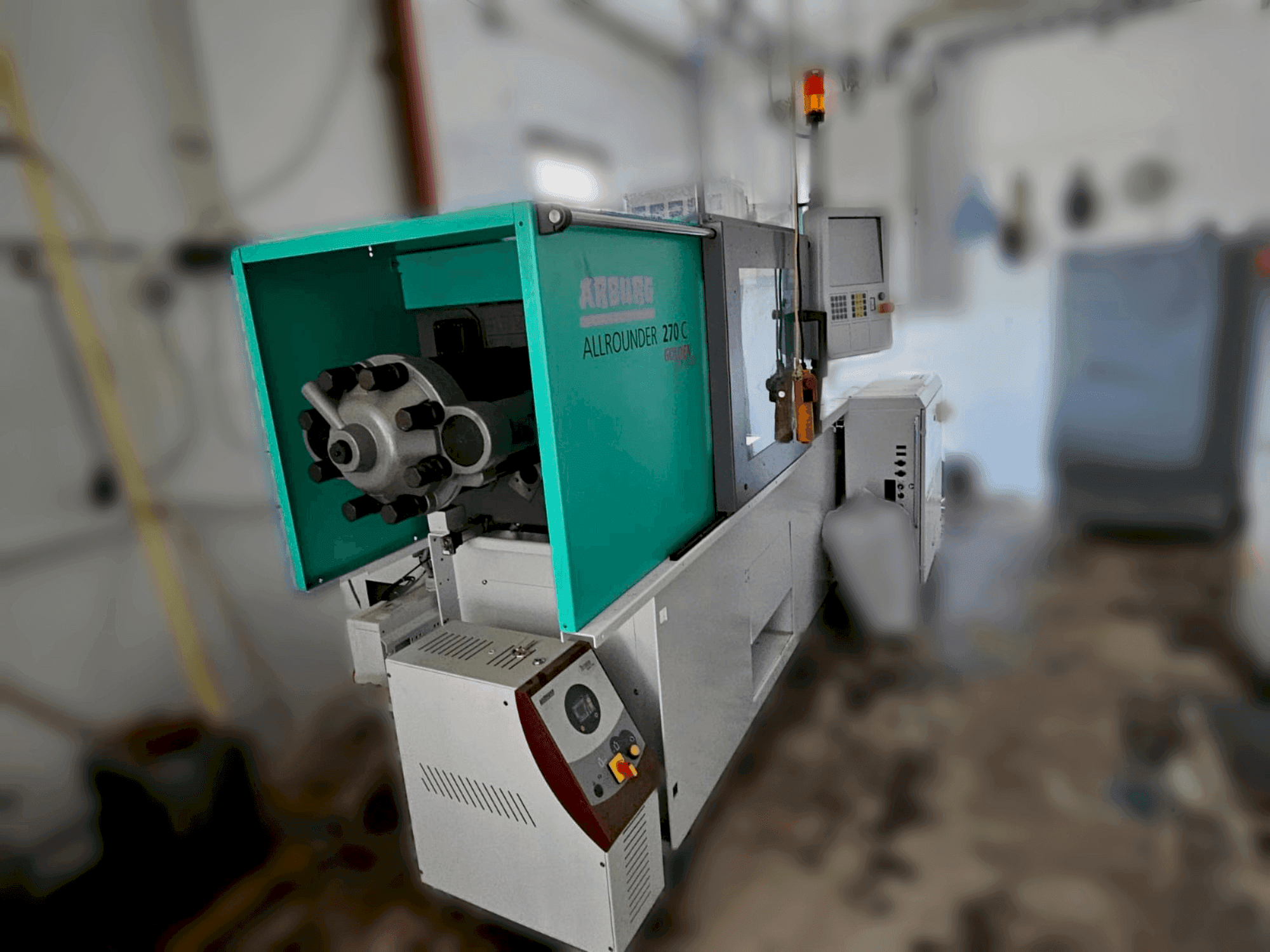 Vista Lateral  da Arburg 270 C 400-70 Golden Edition  máquina