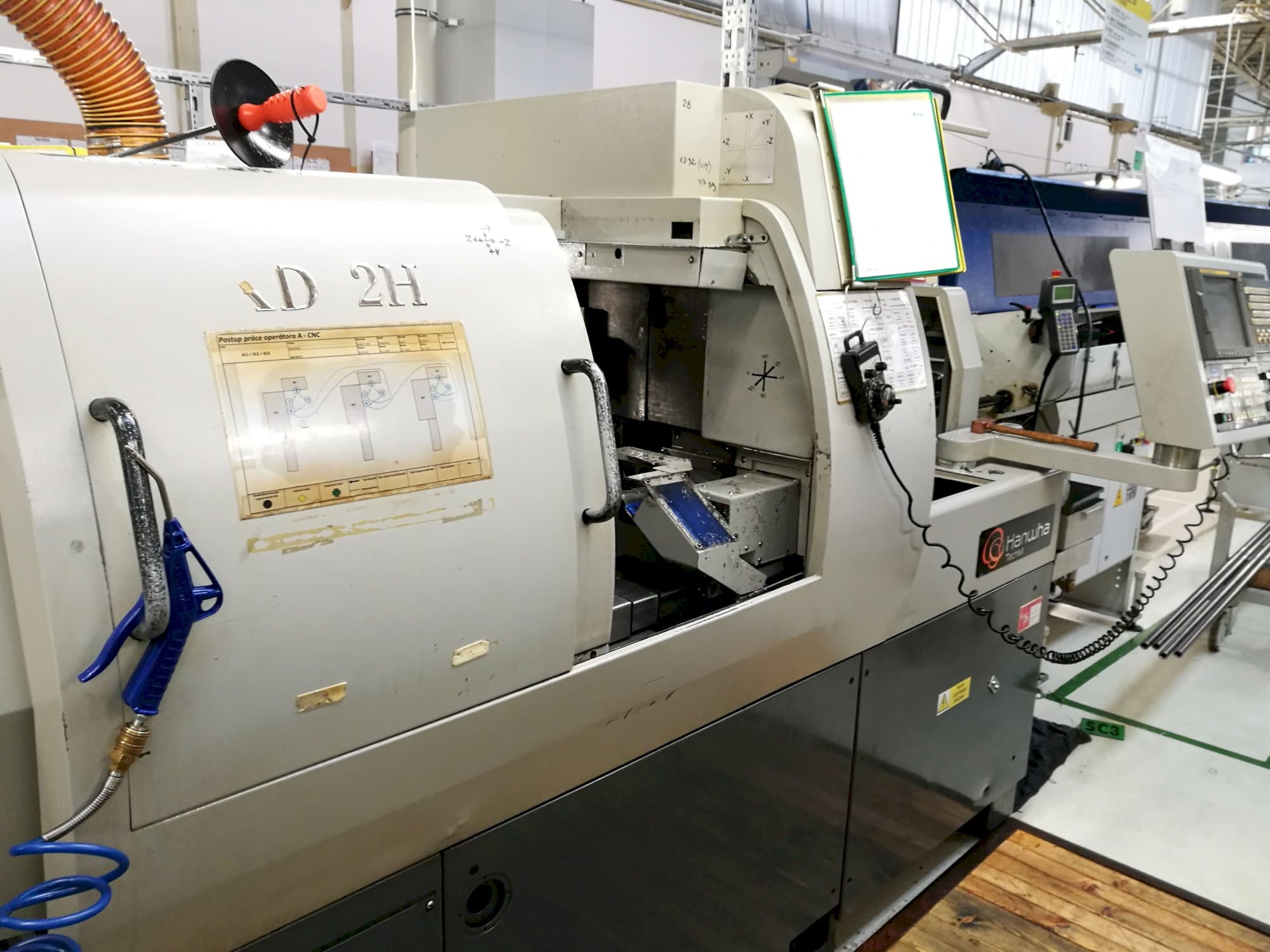 Vista Direita  da Hanwha XD 32 H  máquina