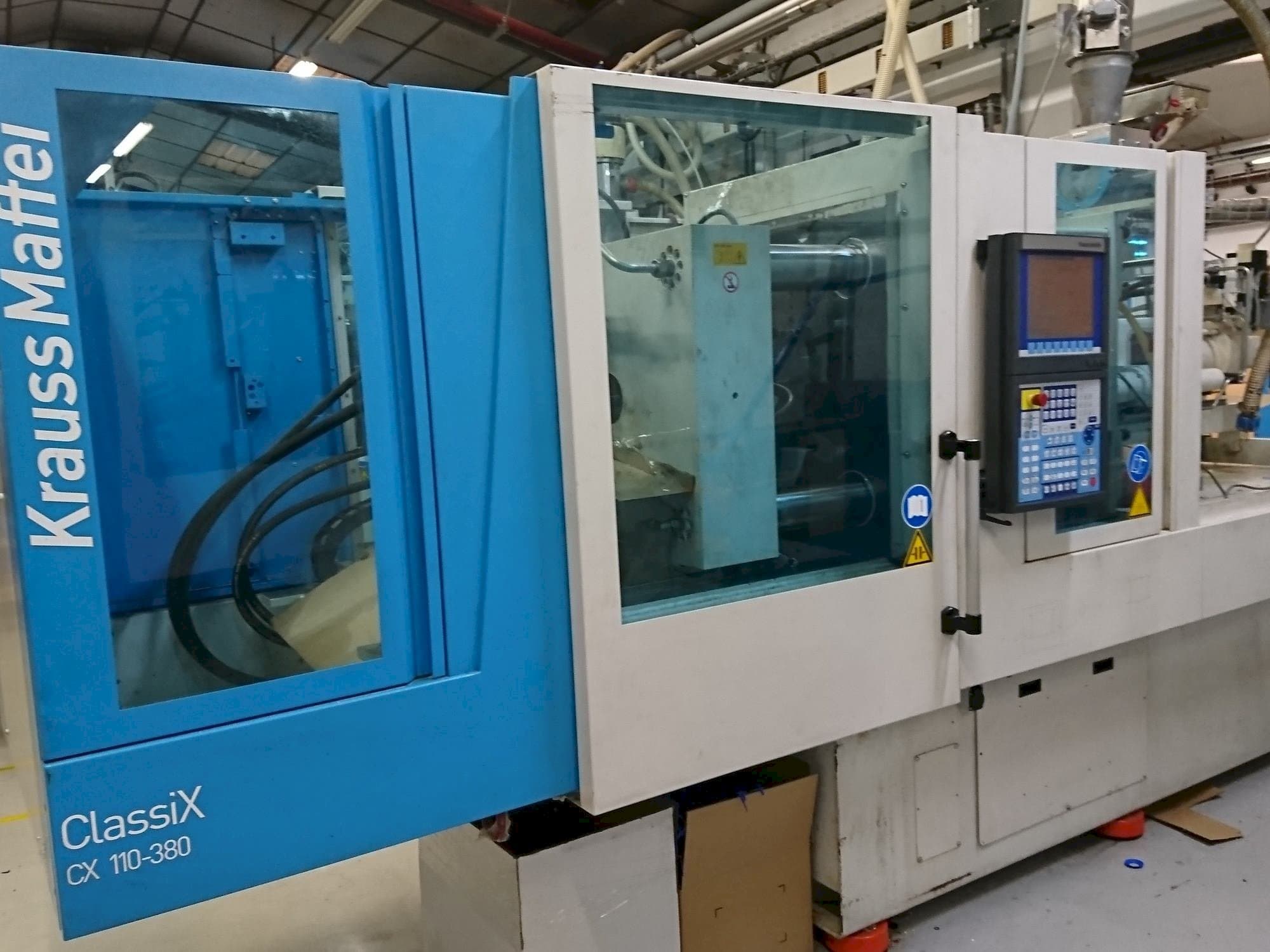 Vista Frontal  da Krauss Maffei 110-380 CX  máquina