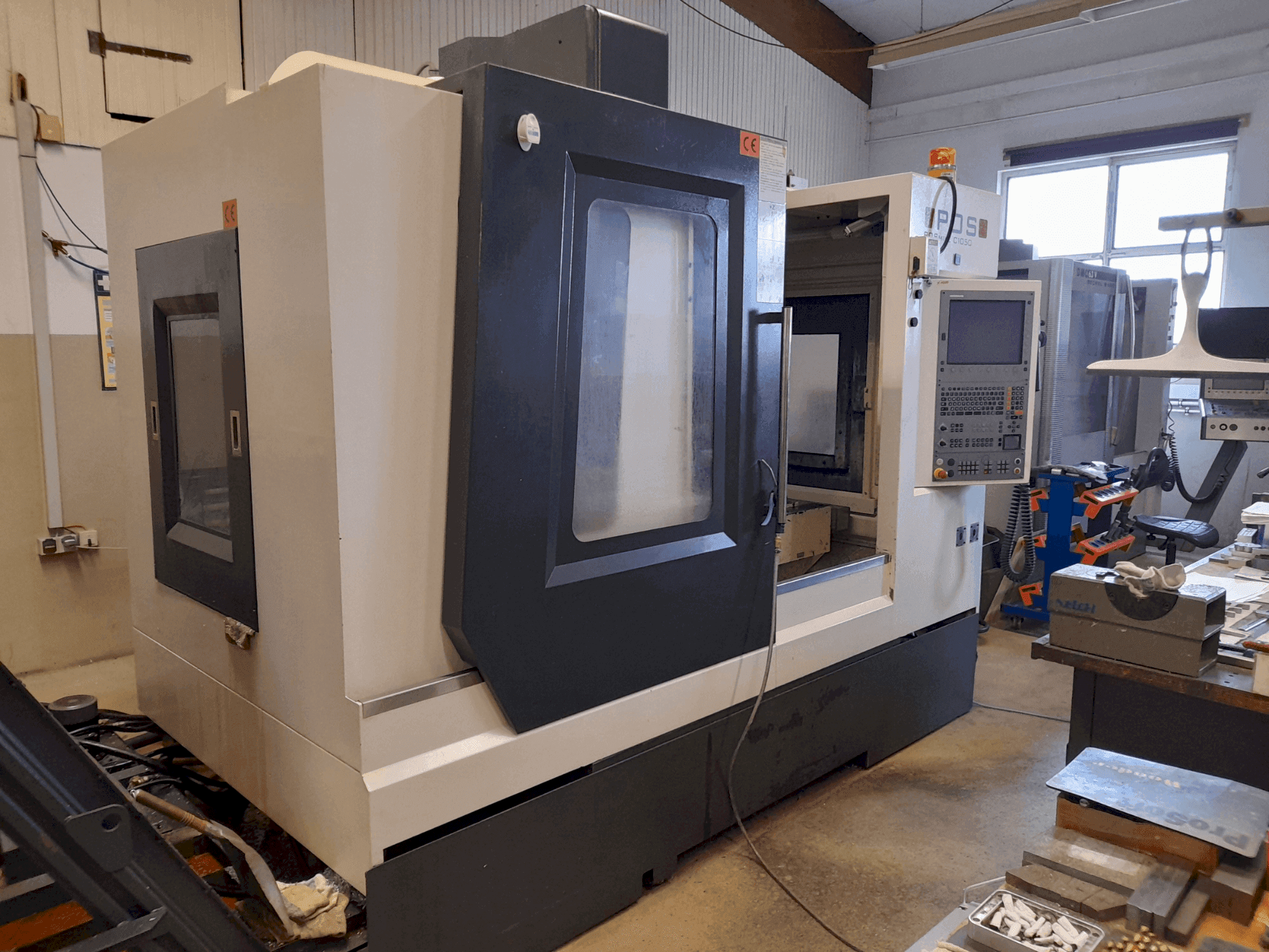 Vista Frontal  da POSmill C 1050  máquina