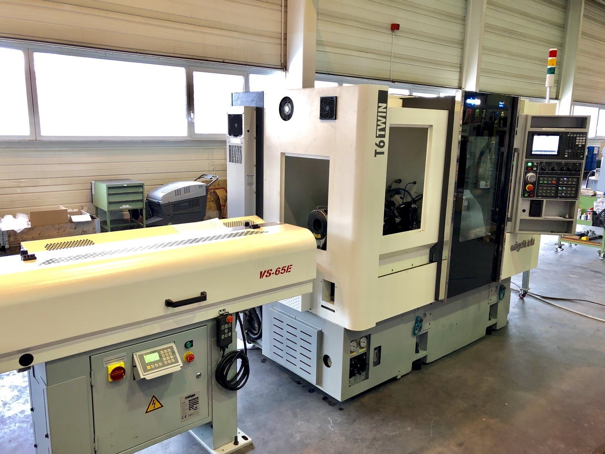 Vista Frontal  da Muga T6 Twin 60  máquina