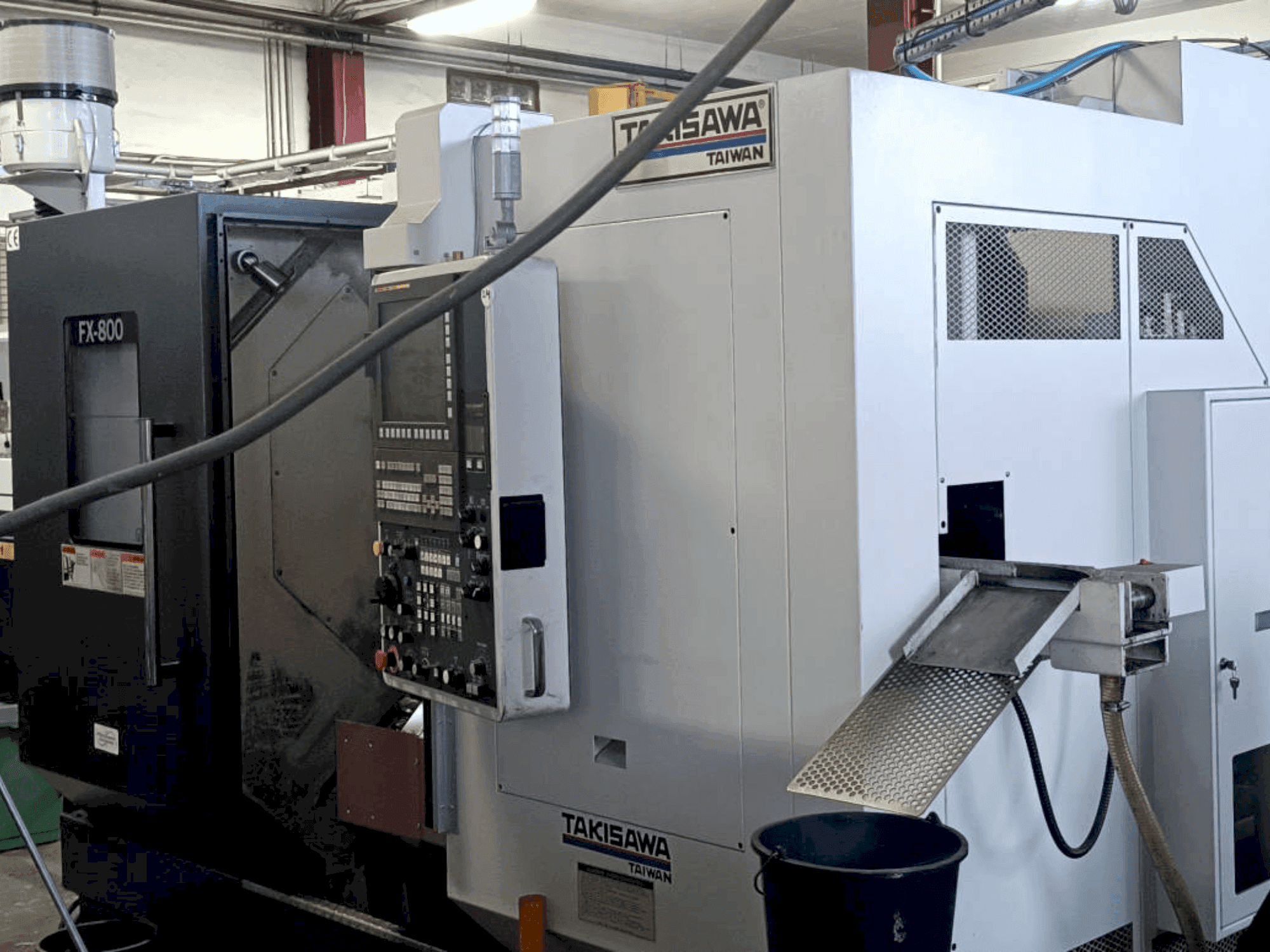 Vista Frontal  da Takisawa FX800  máquina