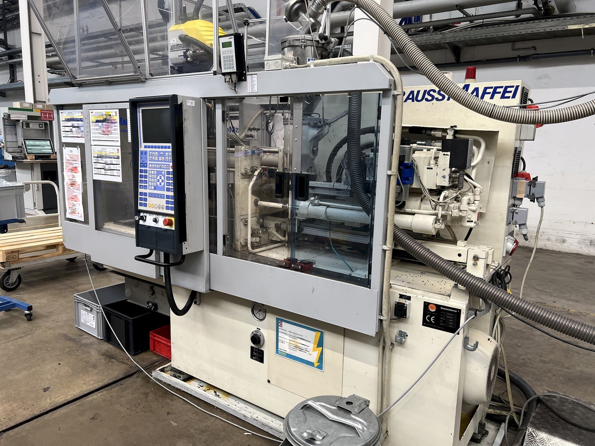 Vista Frontal  da Krauss Maffei KM 50-125 C1  máquina