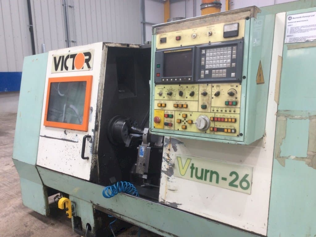 Vista Frontal  da Victor V Turn-26  máquina