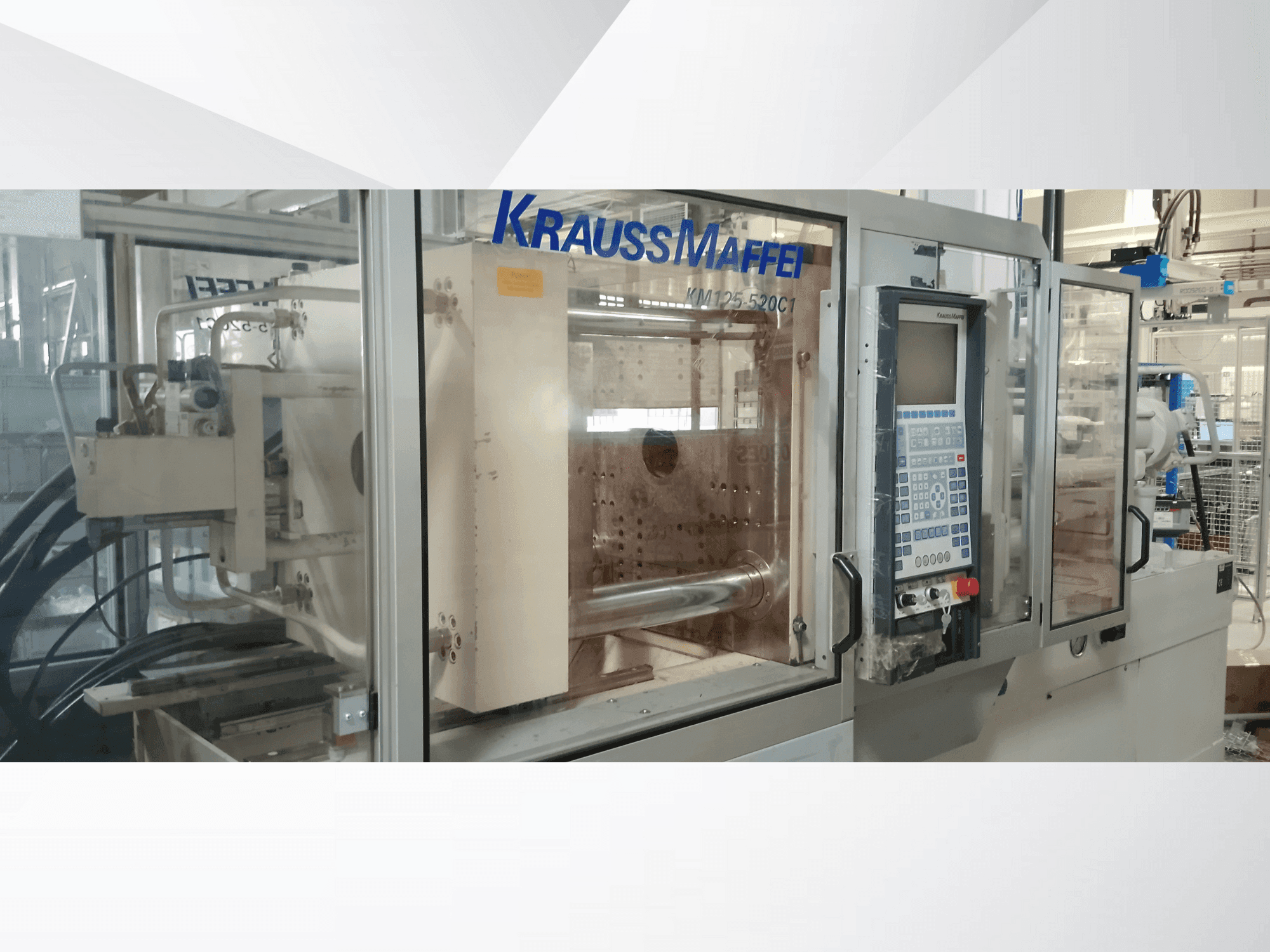 Vista Frontal  da Krauss Maffei 125-520 C1  máquina