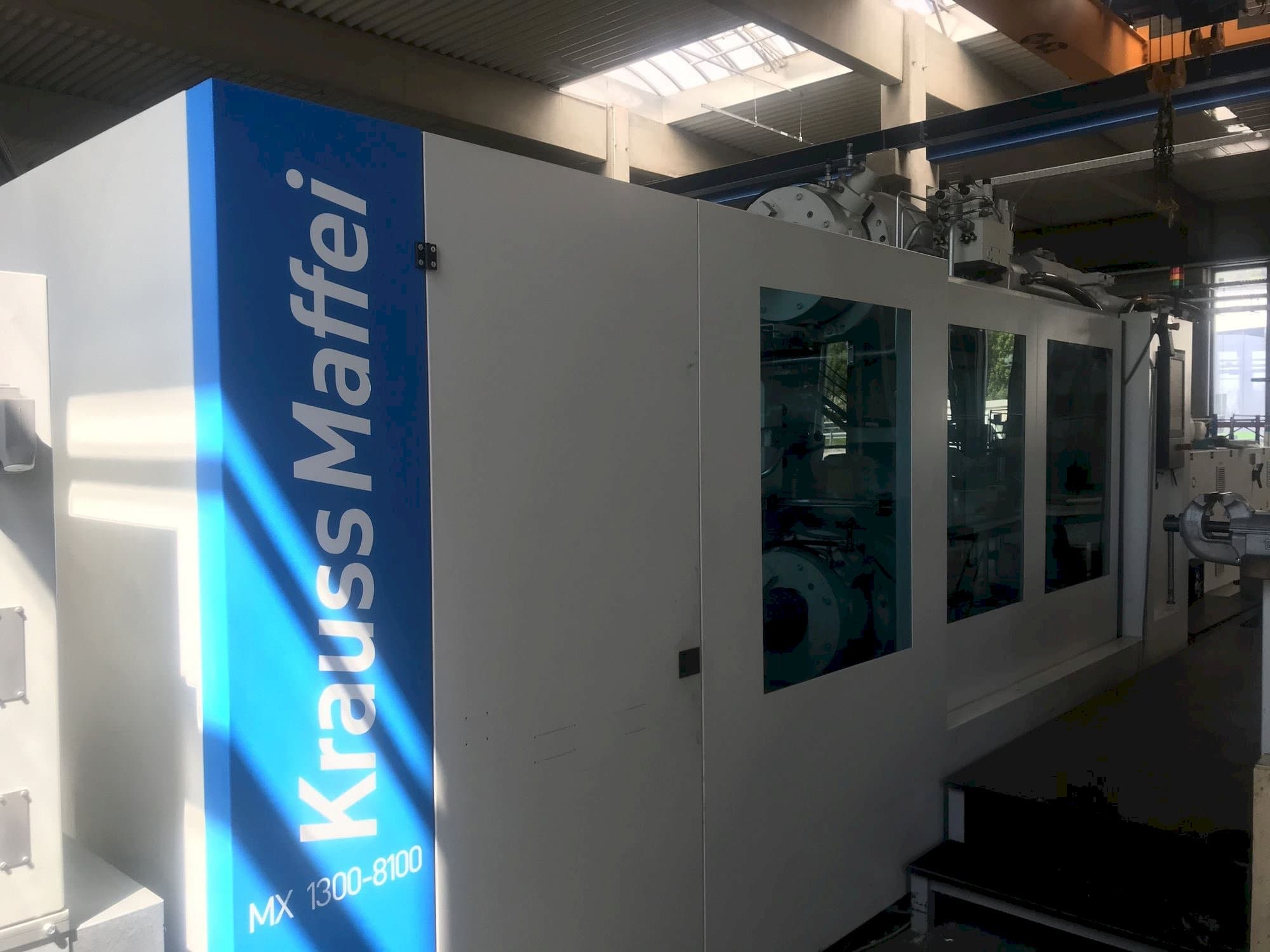 Vista Frontal  da Krauss Maffei 1300-8100 MX  máquina