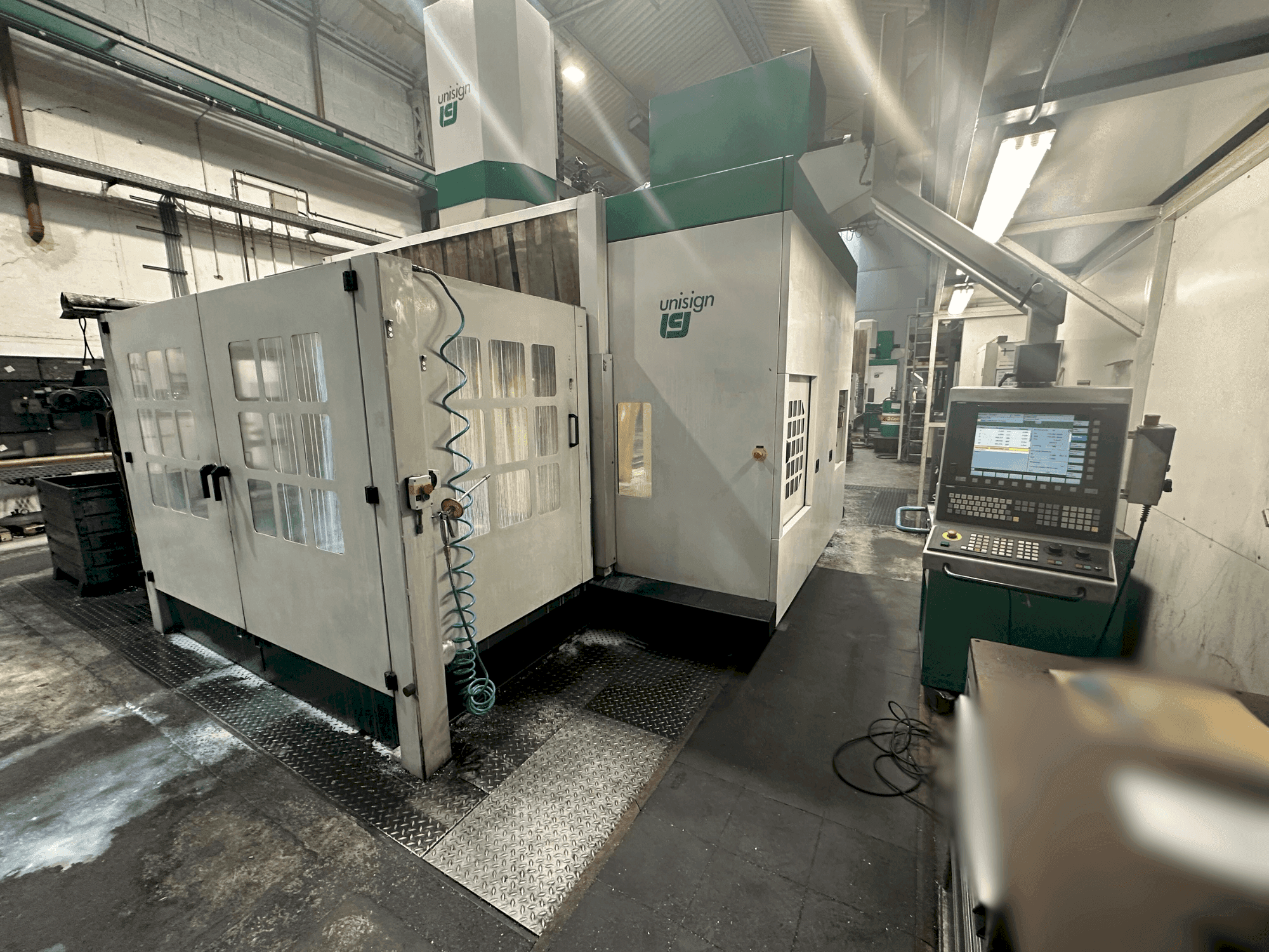 Vista Frontal  da Unisign UNIPORT 6000  máquina