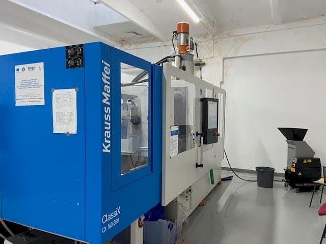 Vista Lateral Esquerda  da Krauss Maffei ClassiX CX 160-380  máquina