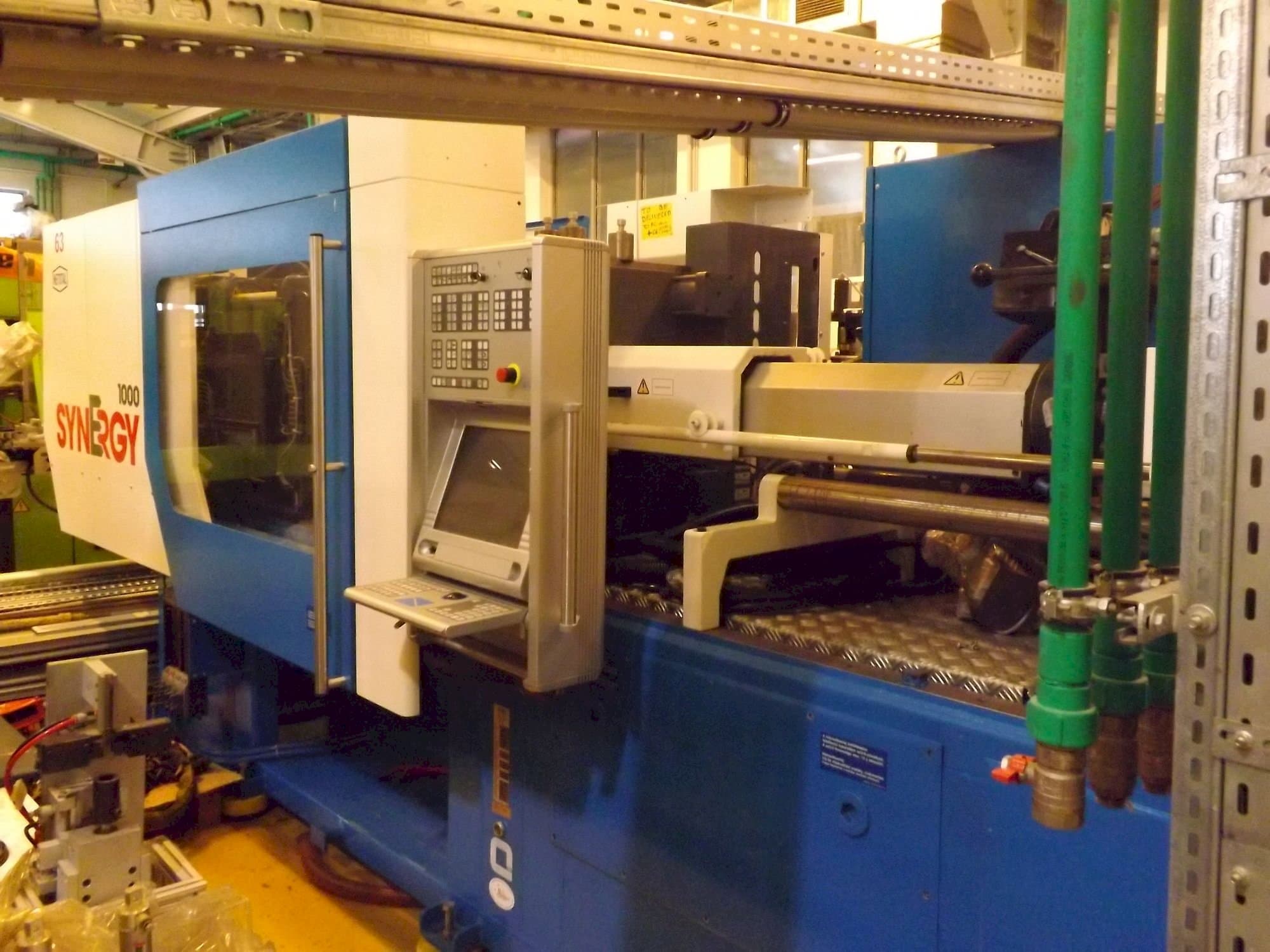 Vista Frontal  da Netstal Synergy 1000 230-110  máquina