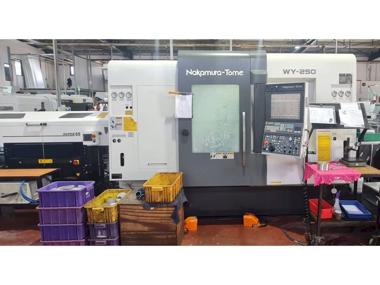 Vista Frontal  da NAKAMURA-TOME WY 250  máquina