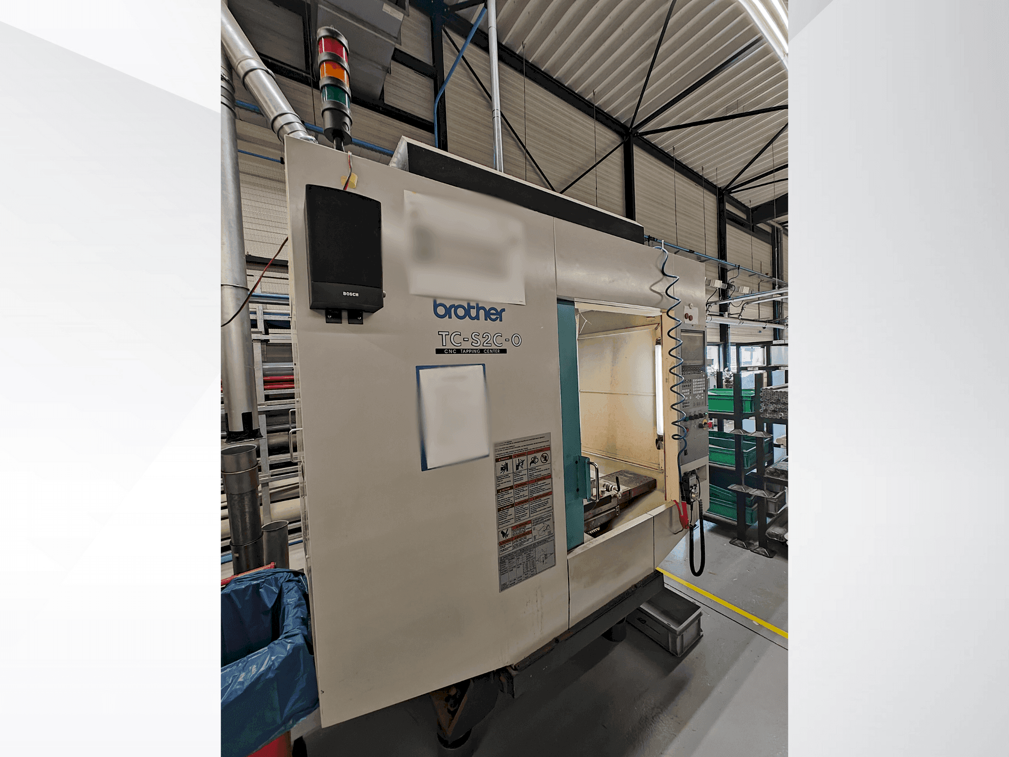 Vista Frontal  da Brother TC-S2C-O  máquina