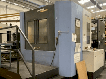 Vista Frontal  da DOOSAN HM 6300 (2009)  máquina