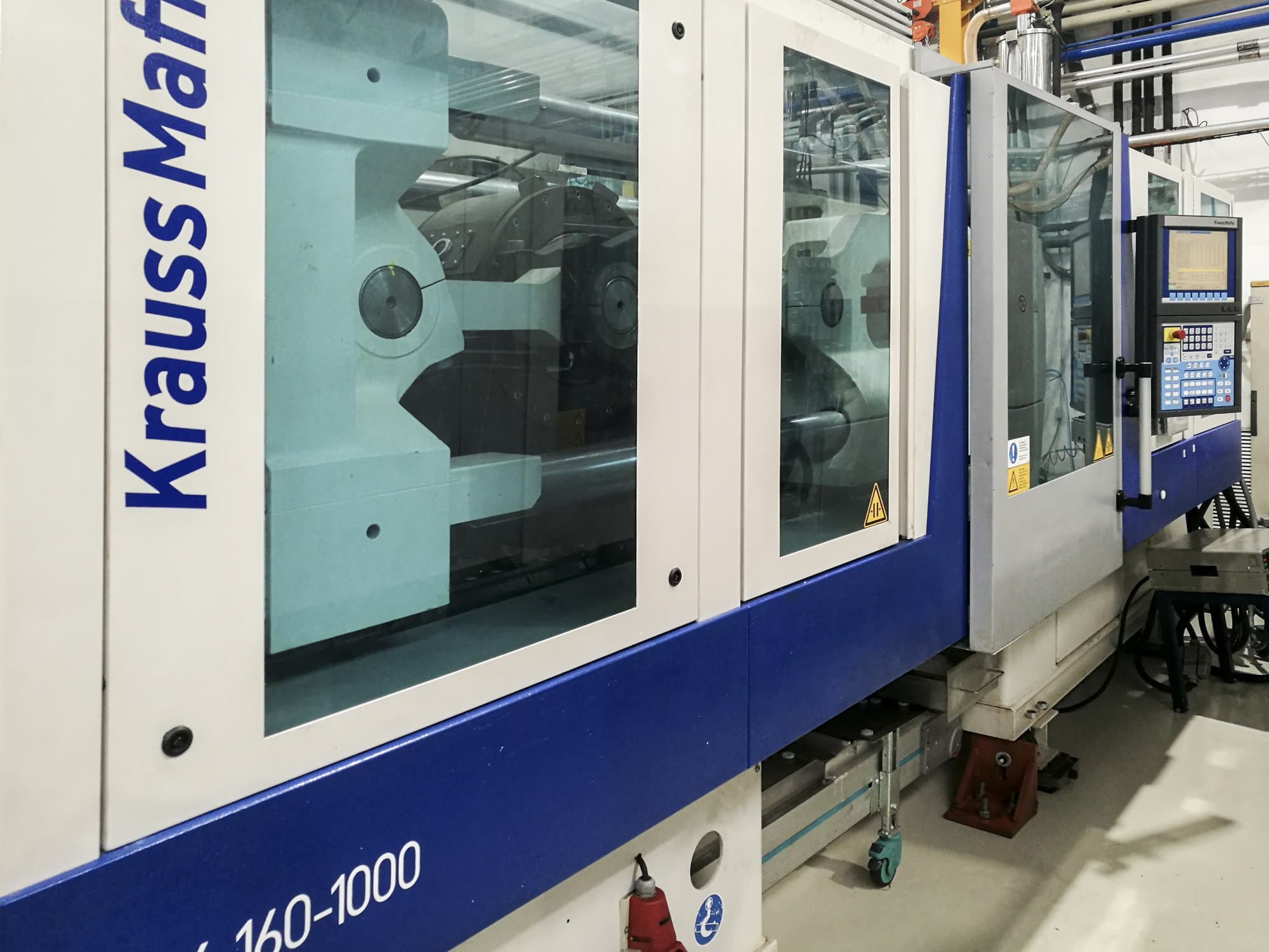 Vista Esquerda  da Krauss Maffei 160-1000 EX  máquina