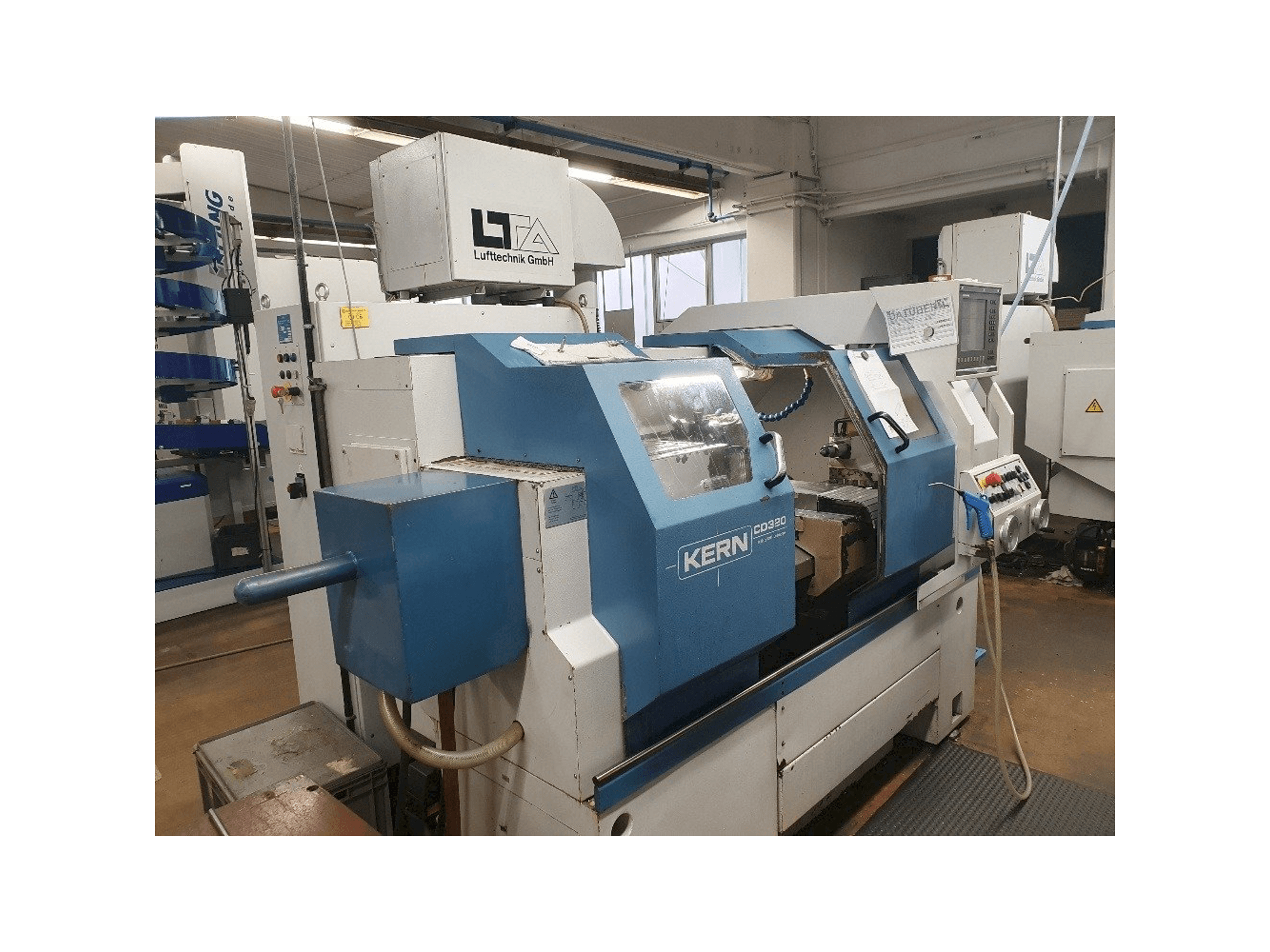 Vista Lateral Esquerda da DTM CD 320 máquina