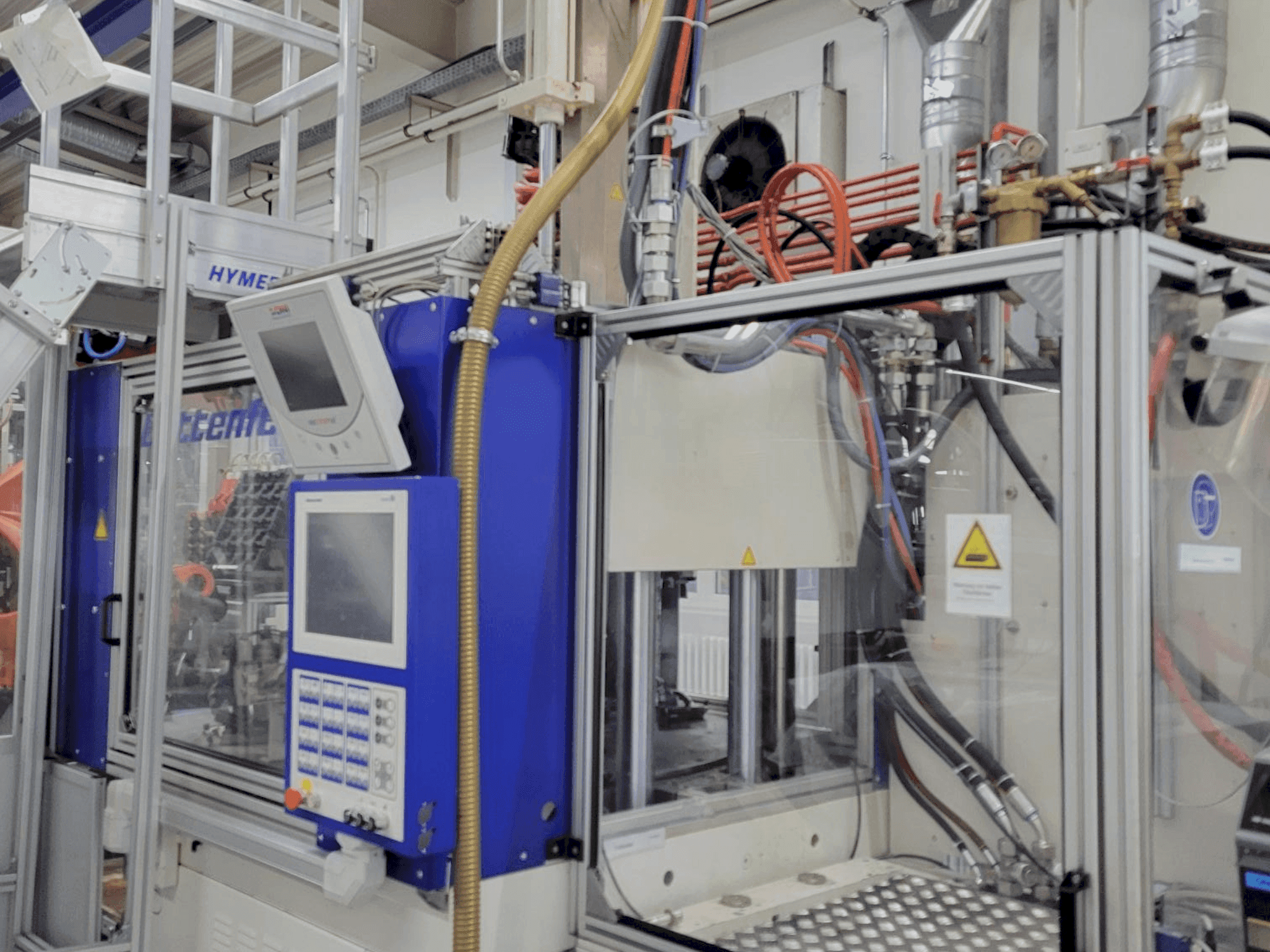 Vista Frontal da Battenfeld VM 150/750V R1520 UNIGLOG B6S máquina