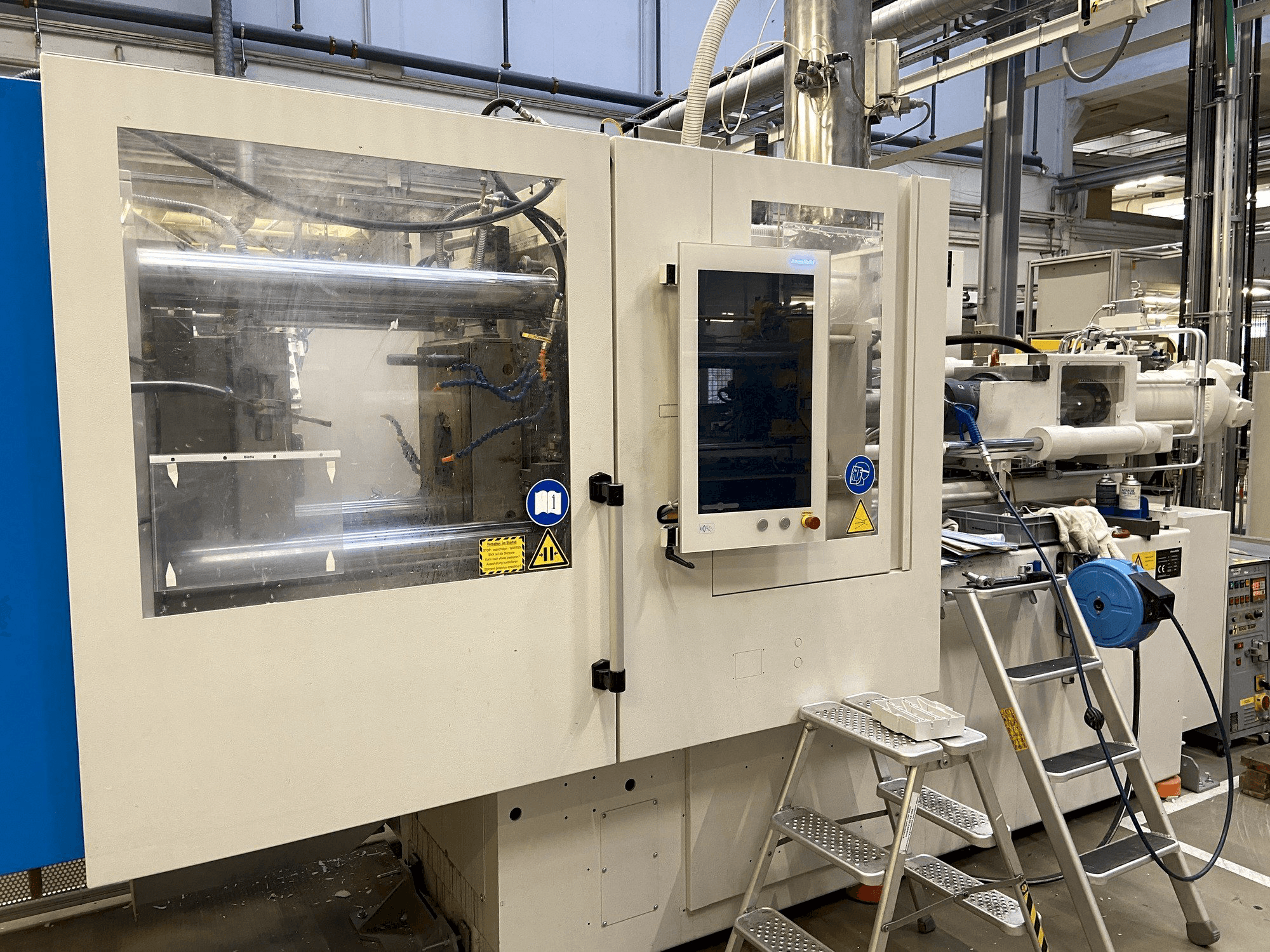 Vista Frontal da Krauss Maffei 130-1000 CX DUR máquina