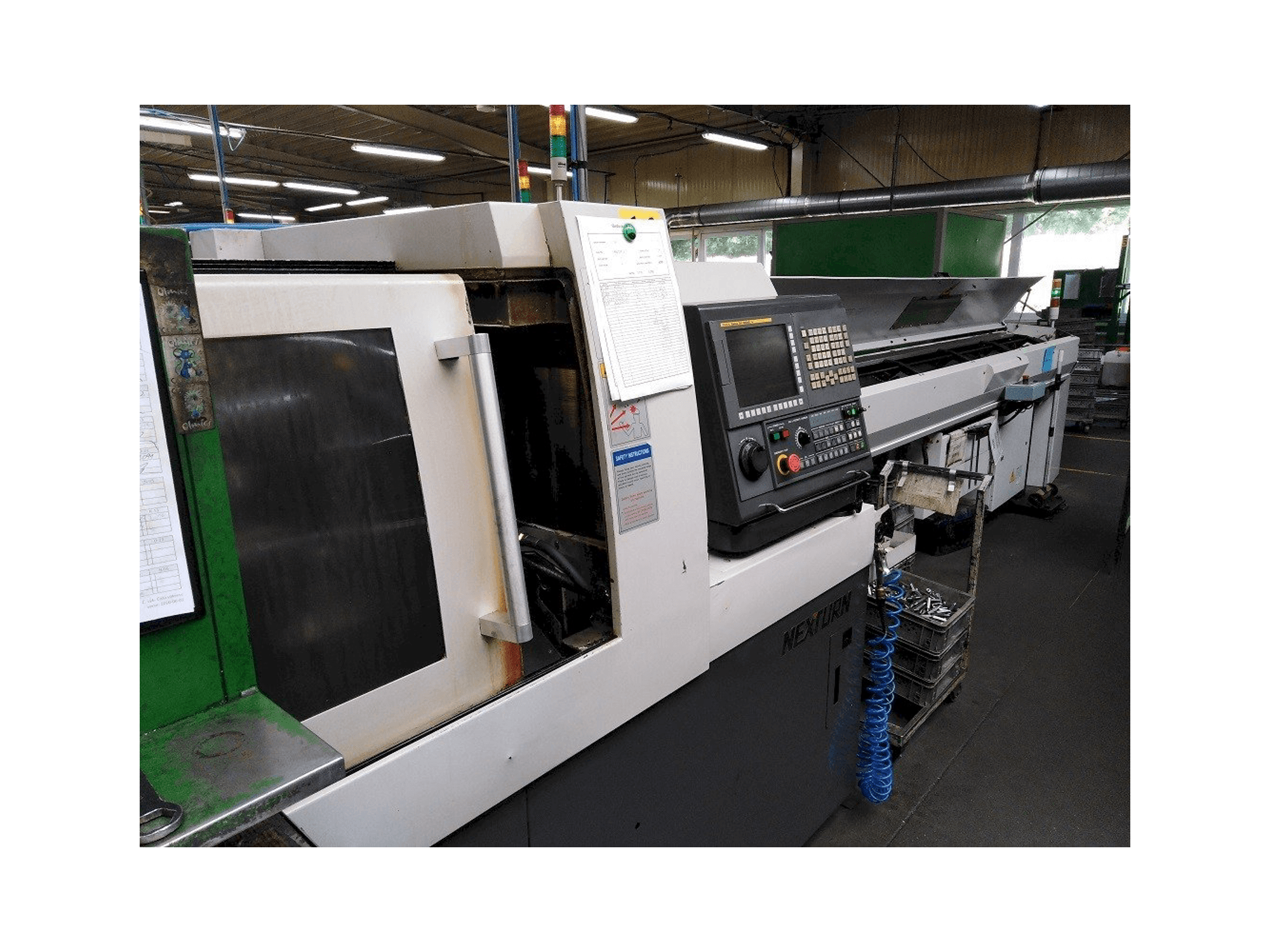 Vista Frontal da Nexturn SA-20E máquina