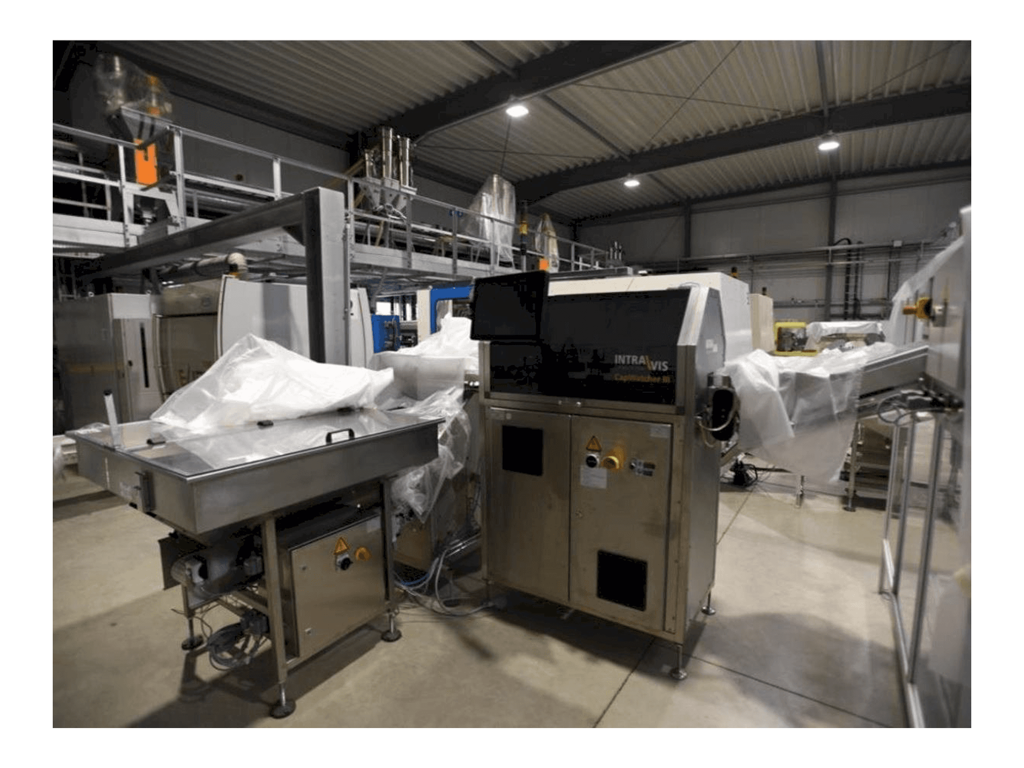 Vista Frontal da INTRAVIS Capwatcher 6275 máquina